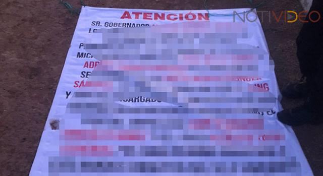 Denuncian a mandos policiales de Zamora en mantas colocadas en Morelia